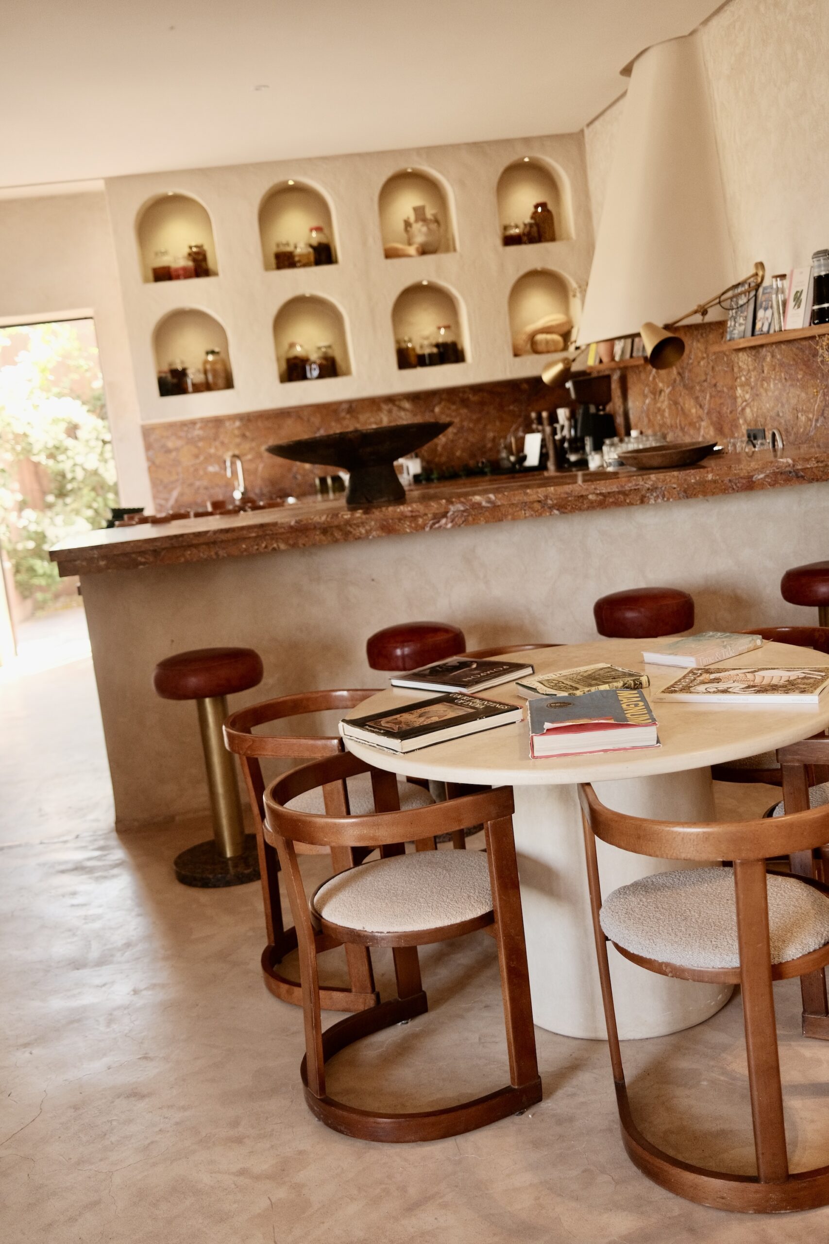 Farasha Farmhouse bar with preserved jars in arched niches