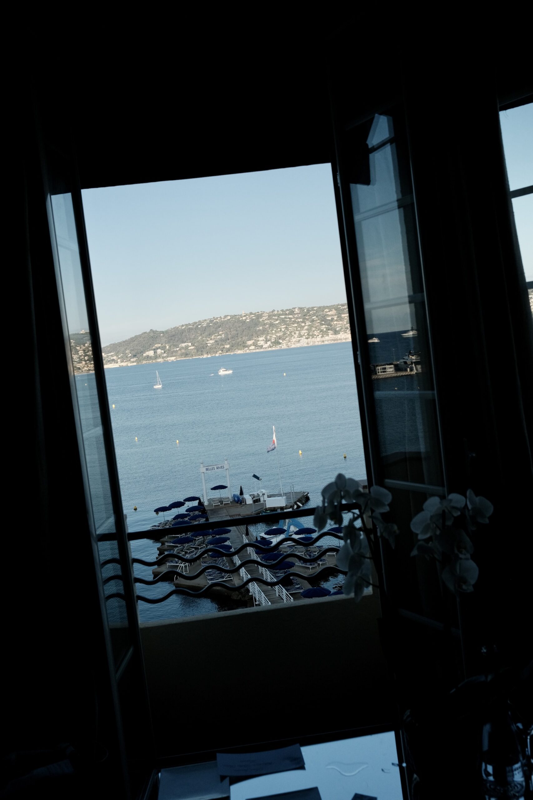 View from a room at Hotel Belles Rives over the Bay of Golfe Juan and the private pontoon